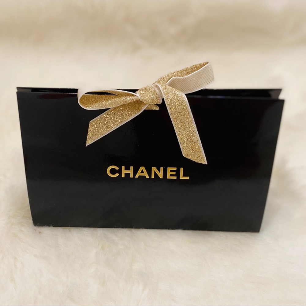 Chanel Gift Bag with ribbon.